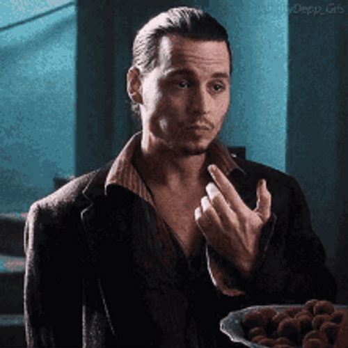Johnny Depp Licking Fingers GIF