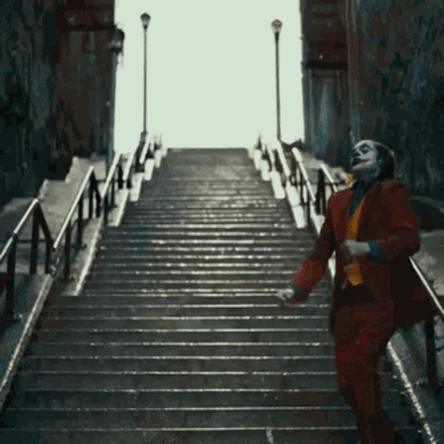 Joker Laughing And Dancing In The Rain GIF