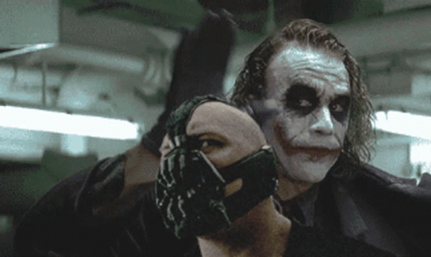 Joker Smacked Bane GIF