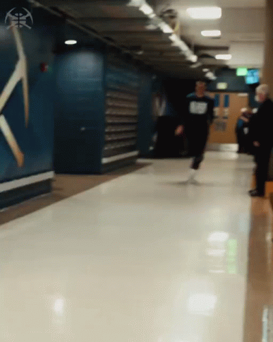 Jokic Sprinting Down Hall GIF