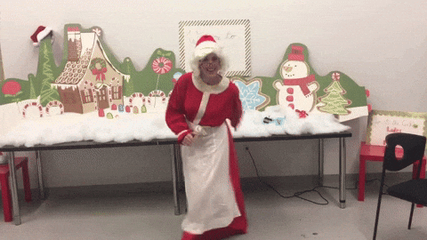 Jolly Lady Santa At Work Party GIF