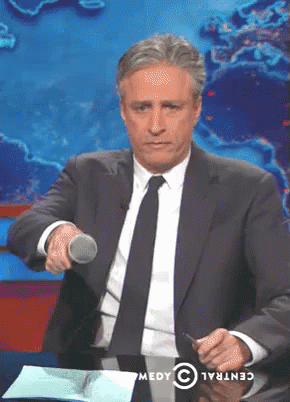 Jon Stewart Mic Drop Meme GIF
