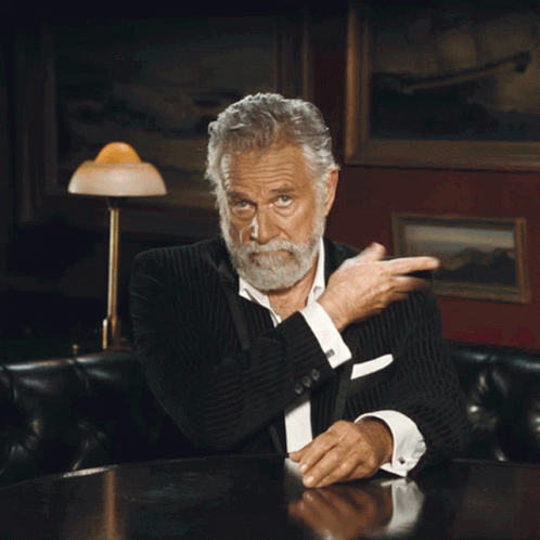 Jonathan Goldsmith Shoulder Brush GIF