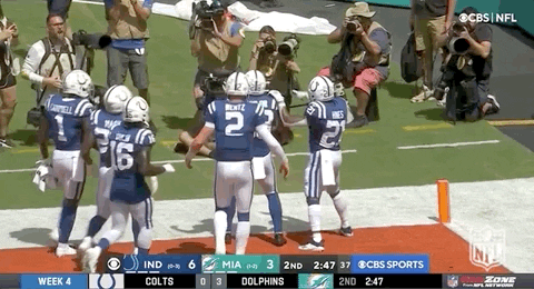 Jonathan Taylor Hugged By Teammates GIF