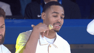 Jordan Poole Biting Medal GIF