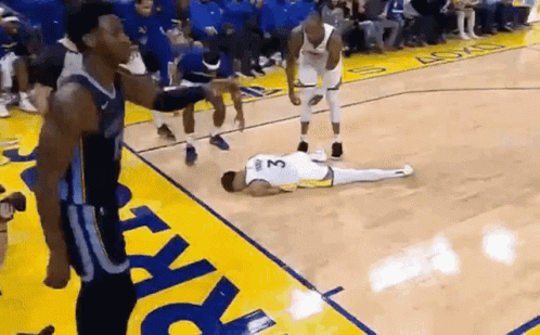 Jordan Poole Laying On The Floor Joking GIF