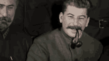 Joseph Stalin Smoking Tobacco Smiling Fun GIF
