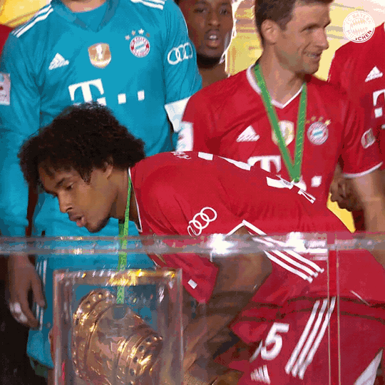 Joshua Zirkzee Carrying Championship Trophy GIF