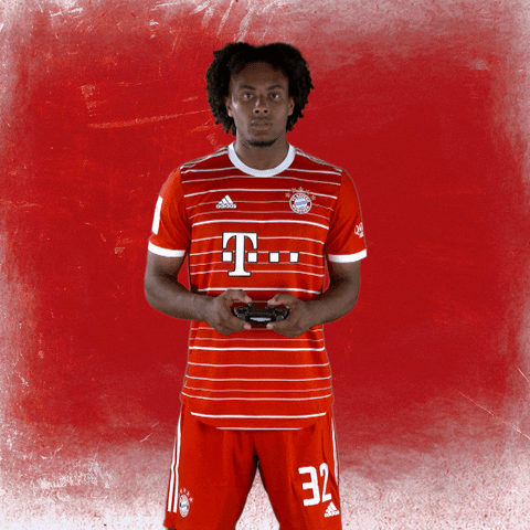 Joshua Zirkzee Holding Playing Game Console GIF