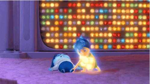 Joy Inside Out Holding Sadness GIF