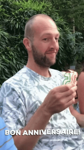 Joyeux Anniversaire Man Blowing Candle With Nose GIF