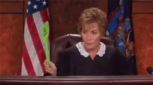 Judge Holding Green Spatula American Flag