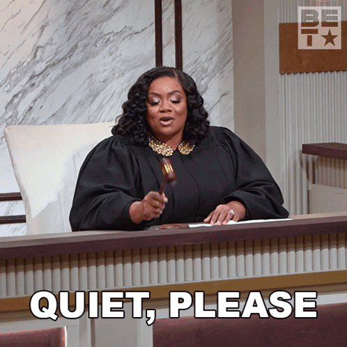 Judge Sitting at Desk Quiet Please