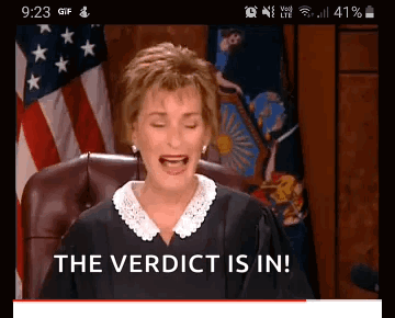 Judge Sitting in Front of American Flag