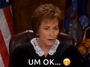 Judge Sitting in Front of American Flag