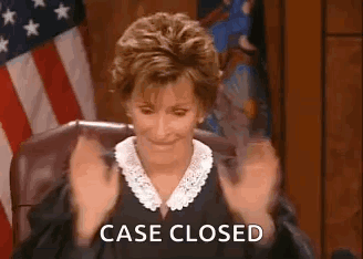 Judge Sitting with Hands in Air Case Closed