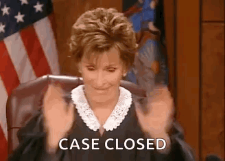 Judge Sitting With Hands In Air Case Closed