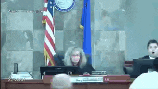 Judge Wearing Mask at Desk