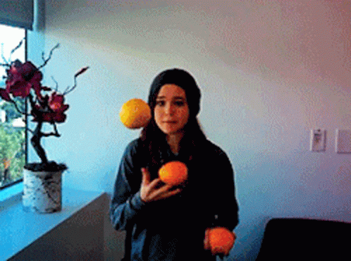 Elliot Page Juggling Oranges GIF