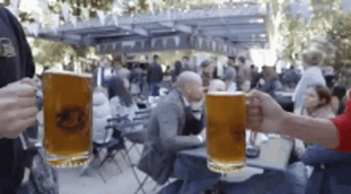 Jugs With Beer At Oktoberfest GIF