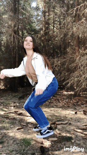 Girl In White Sweater Jumping For Joy GIF
