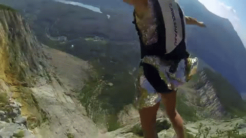 Jumping Off A Cliff Woman Diving GIF