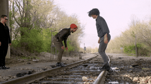 Jumping On Balance Beam Train Tracks GIF