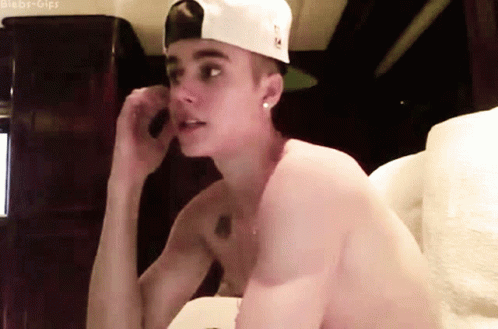Justin Bieber Seating In His Couch GIF