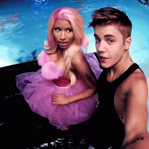 Justin Bieber And Nicki Minaj Are Posing For A Picture GIF