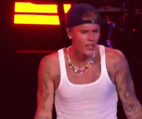 Justin Bieber In White Tank Top And Cap GIF
