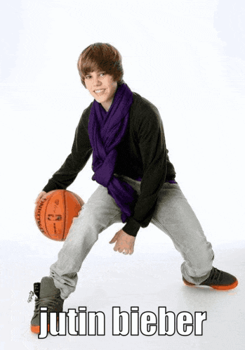 Justin Bieber Is Holding A Spalding Basketball GIF