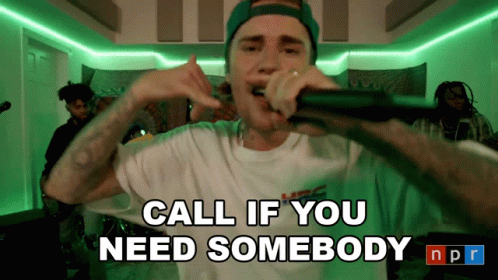 Justin Bieber Singing Into A Microphone With The Words Call If You Need Somebody Npr GIF