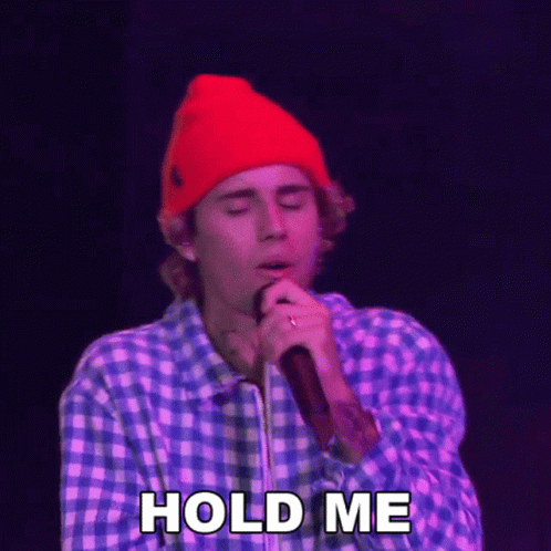 Justin Bieber Singing Into Microphone