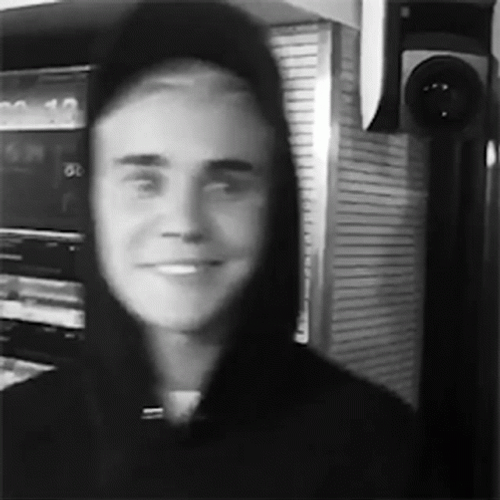 Justin Bieber Smiling In A Wearing Black Hoodie GIF
