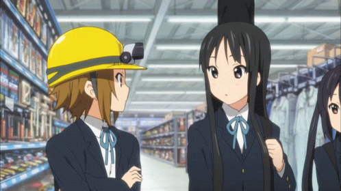 K-on Yui Hirasawa Flashing Light On Mio Akiyama GIF