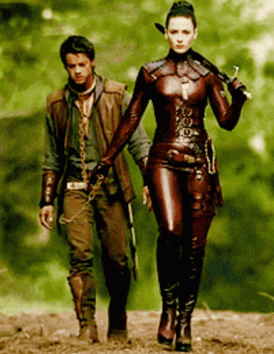 Kahlan Amnell Red Leather Suit Pulling Slave GIF