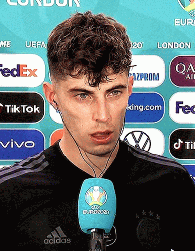 Kai Havertz Touching His Face During An Interview GIF