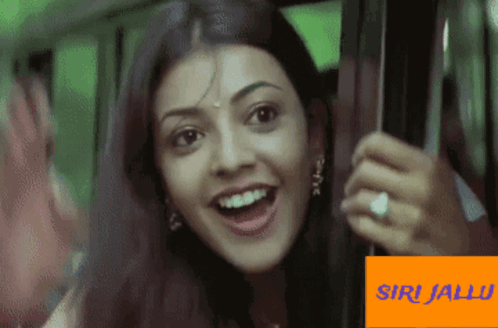 Kajal Aggarwal Hello Siri While Waving Hand GIF