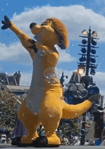 Kangaroo Mascot Dancing Blowing Soap Bubbles
