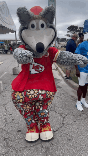 Kansas City Chiefs Mascot In Red Shirt And Floral Pants GIF