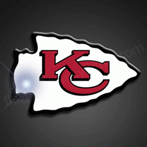 Kansas City Chiefs Mascot in Red Shirt With KC Logo