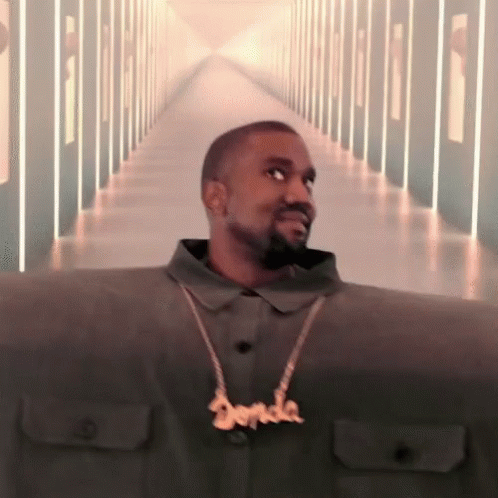 Kanye West Standing in Hallway