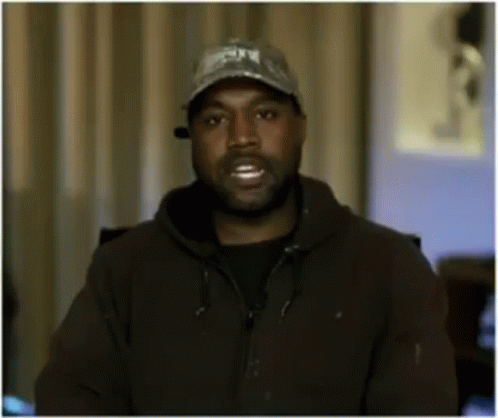 Kanye West Wearing Hat and Hoodie