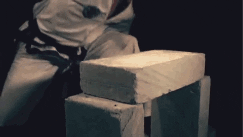 Karate Chop Slow Motion Breaking Bricks GIF