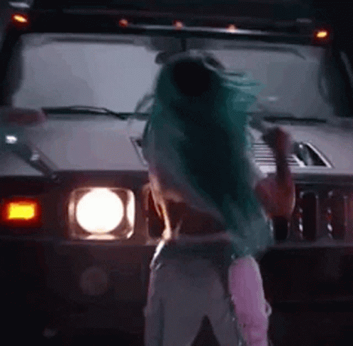 Karol G Blue Hair Flipping GIF