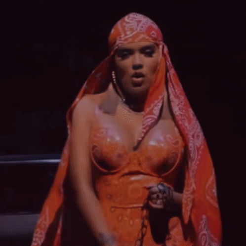 Karol G Night Shoot Orange Outfit GIF