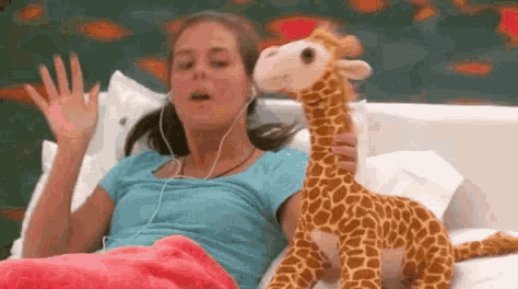Keala With Giraffe Stuff Toy GIF