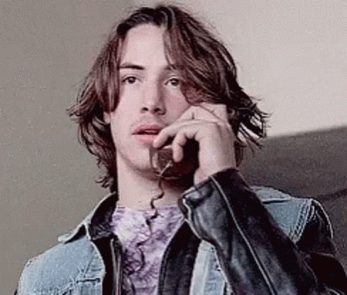 Young Keanu Reeves On The Phone GIF