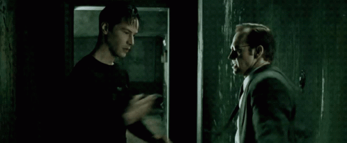 Keanu Reeves Blocking Throat Punch GIF