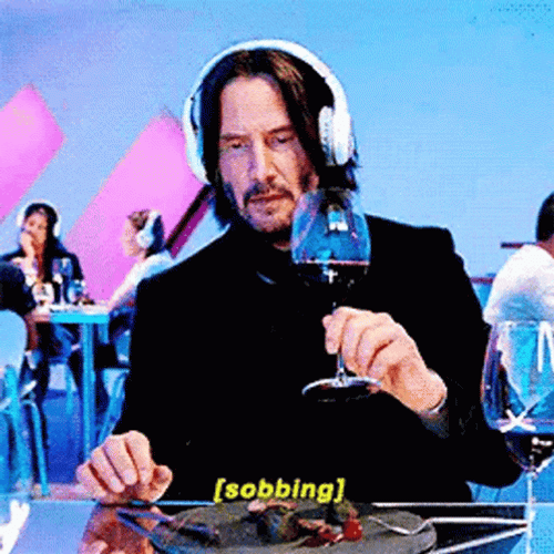 Keanu Reeves Cheers GIF